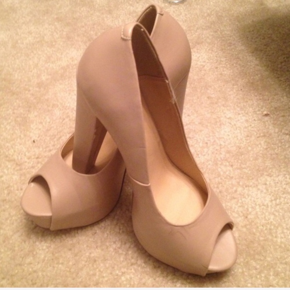 Tan peep toe pumps. Size 6.5